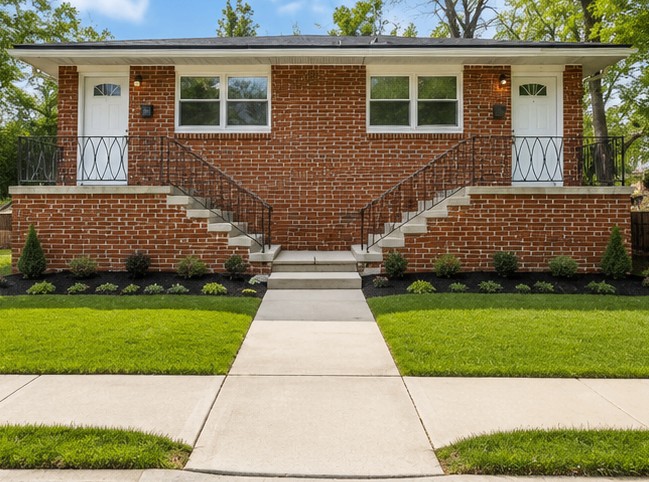 2306 E 14th St after — updated 4-unit property exterior in Chattanooga