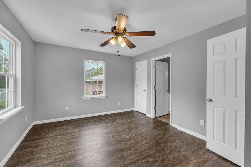Bedroom with new floors and ceiling fan at 2007 Wilson in Chattanooga